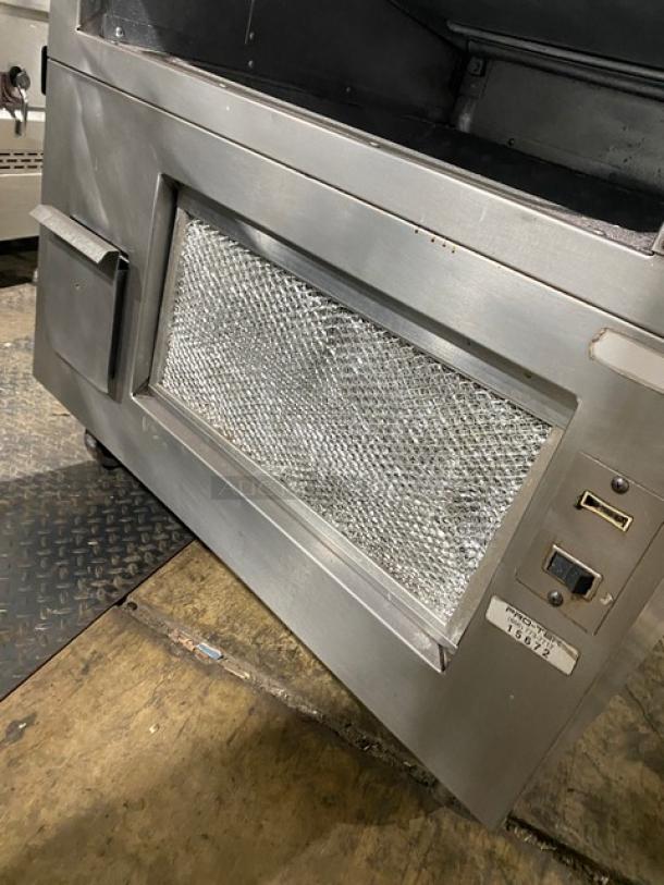 Southbend stainless steel gas-powered upright double deck infrared broiler on casters, commercial kitchen equipment.
