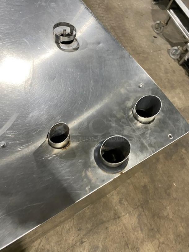 Rational SelfCooking Center stainless steel combi oven top view, showing vent openings. Electric-powered with built-in pan slide.