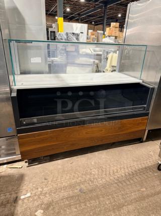 Structural Concepts SBZ6652DR refrigerated display case with rear access sliding doors, enclosed top glass showcase, 220V, on legs.