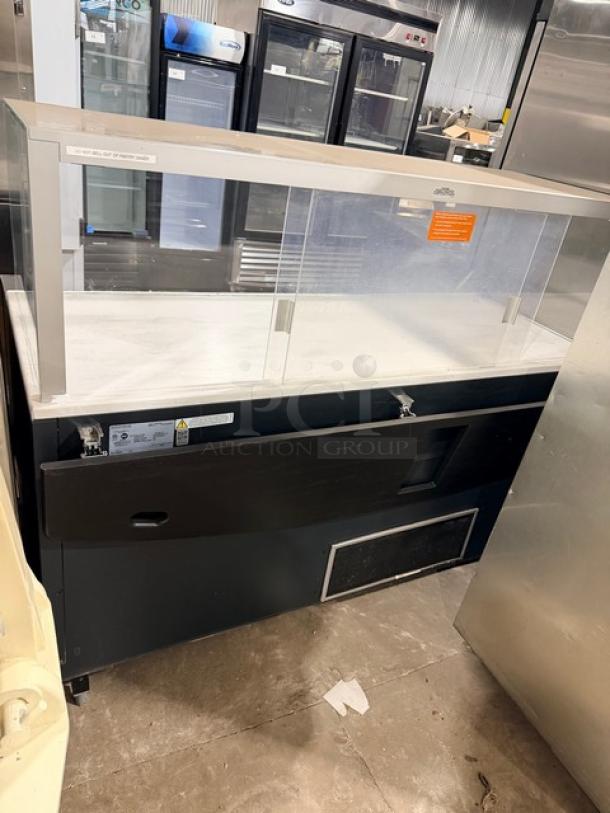 Structural Concepts SBZ6652DR black refrigerated open merchandiser with enclosed top glass showcase, rear sliding doors.