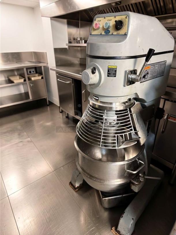 Prime condition Globe SP40P mixer, 40 qt capacity, 2 HP motor, NSF & ETL listed, fully tested, visible controls and safety labels.