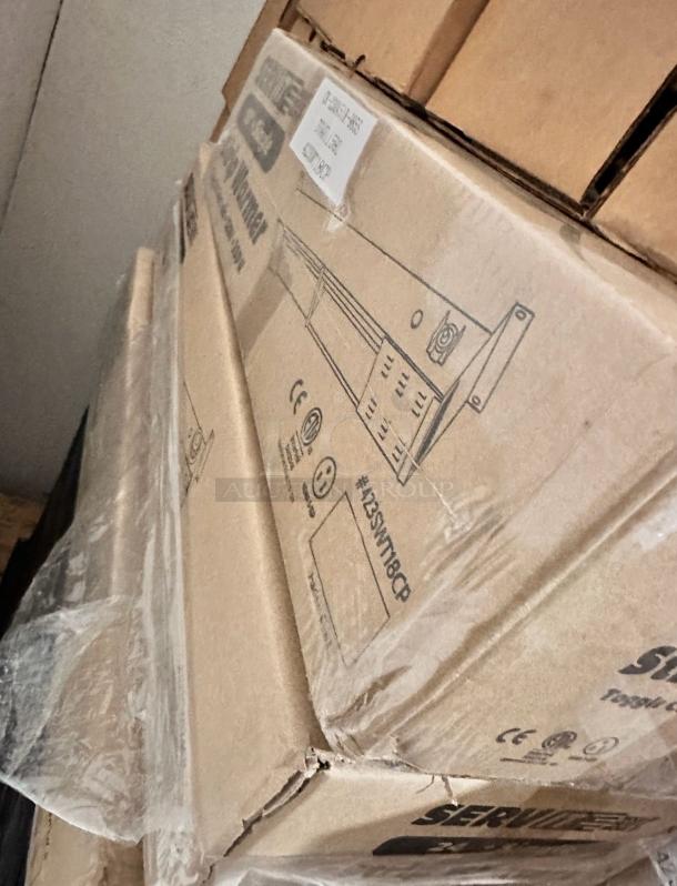 Brand new ServIt 36" Single Strip Warmer, model 423SWT36, in factory-sealed box, showing toggle control and voltage info.