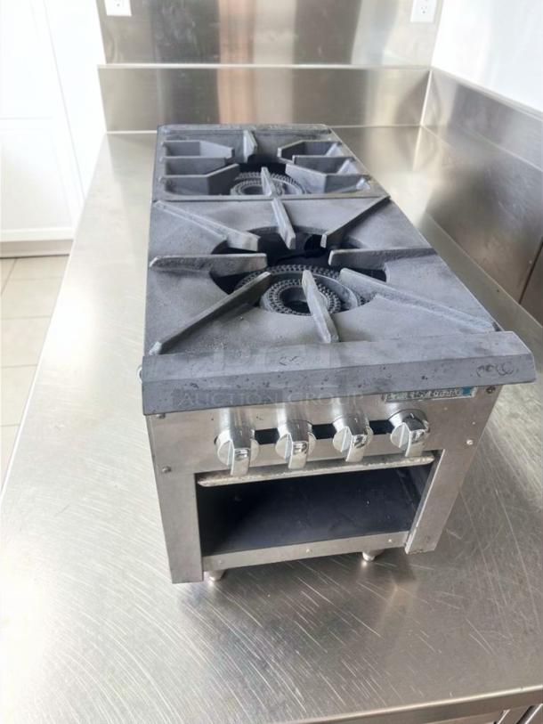 Superior condition Vulcan 36" commercial gas range, 4 burners, open cabinet base, fully operational, model VUL-L-RNG-0624.