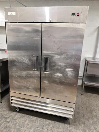 Stainless steel double door commercial reach-in refrigerator, model COM-L-RFE-0376, UL listed, fully tested, excellent condition.
