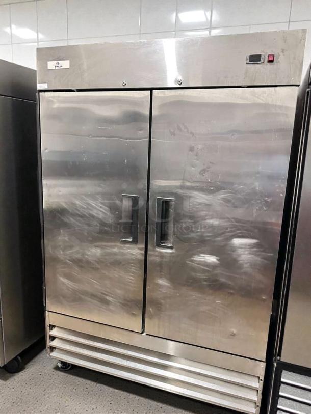 Stainless steel double door reach-in refrigerator, commercial grade, UL listed, premium condition, model COM-L-RFE-0376.