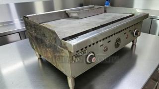 Vulcan commercial gas countertop griddle, heavy-duty flat top, fully tested, operational, visible markings, durable construction.