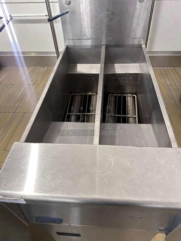 Pitco SG14T commercial gas fryer, 40 lb capacity, stainless steel, NSF & ETL listed, dual vat, top-tier condition, natural gas.