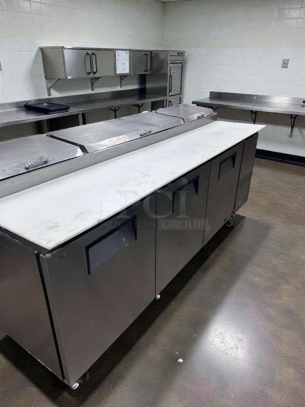 Pristine True TPP-93 pizza prep table, 93", 3-door, cutting board top, fully tested, excellent condition, True Manufacturing.
