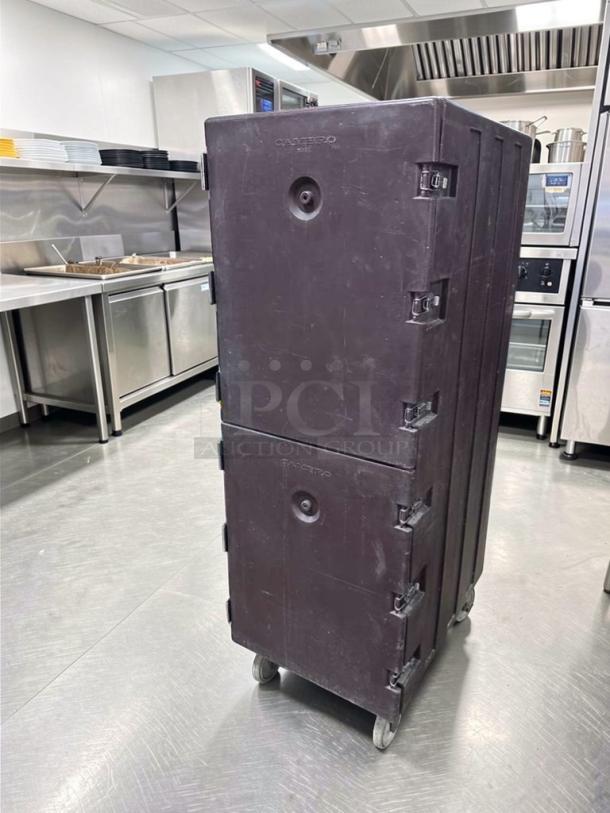 Exceptional condition Cambro Camcarrier food transport cabinet, double door, heavy-duty, fully tested, black, on casters.