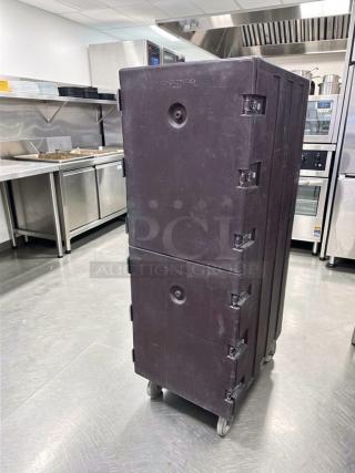 Exceptional condition Cambro Camcarrier food transport cabinet, double door, heavy-duty, fully tested, black, on casters.