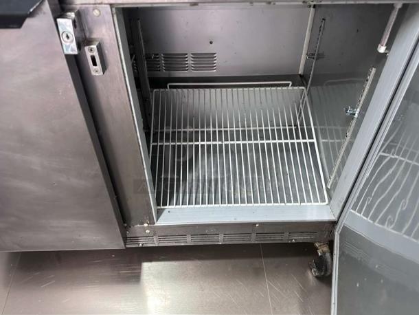Beverage-Air stainless steel undercounter refrigerator with two doors, commercial model, excellent condition, fully operational.