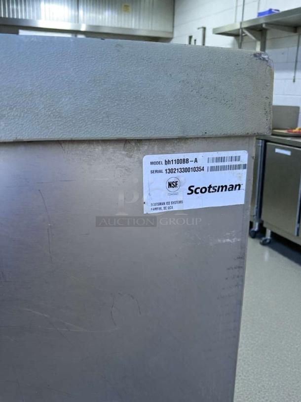 Immaculate Scotsman BH1100BB-A commercial ice storage bin, NSF certified, with visible label indicating model and serial number.
