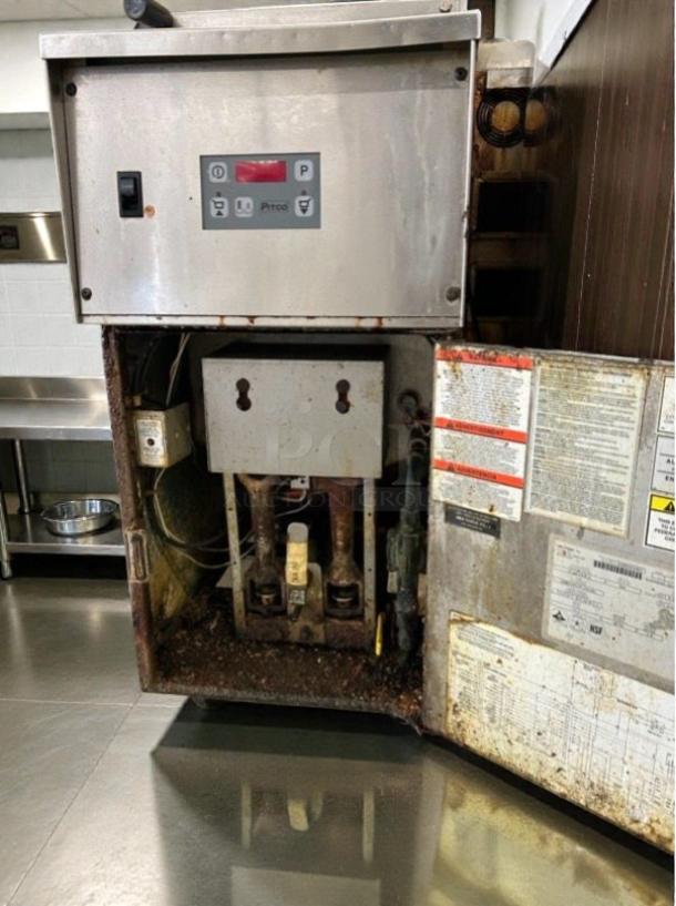 Pitco RTG14 gas fryer, 15-gallon, NSF listed. Interior view shows burner assembly, control panel. Fully tested, operational.