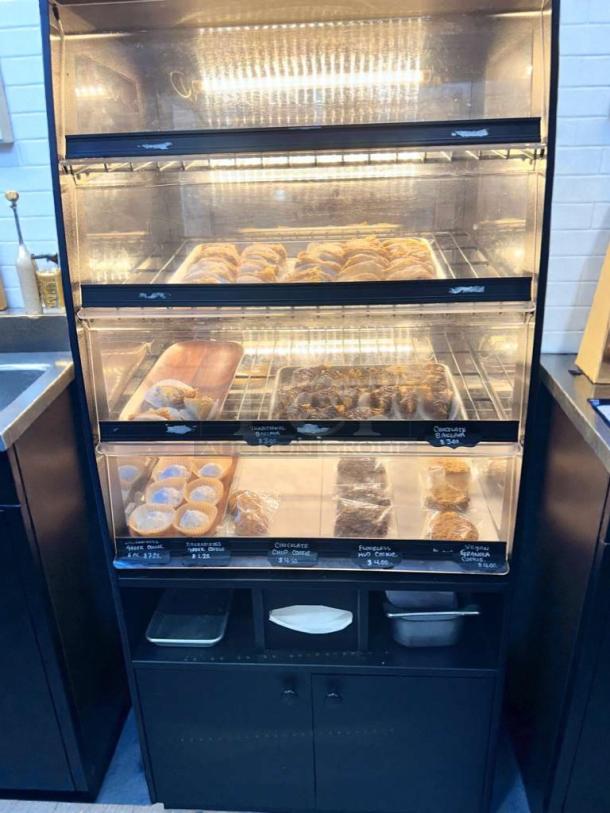Turbo Air refrigerated bakery display case, LED lit, holds pastries. Model TA-L-BDC-0512, outstanding condition, fully operational.