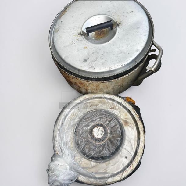 Commercial Foodservice Cookware aluminum stock pot with lid, inspected, heavy-duty, for restaurant use, signs of wear.