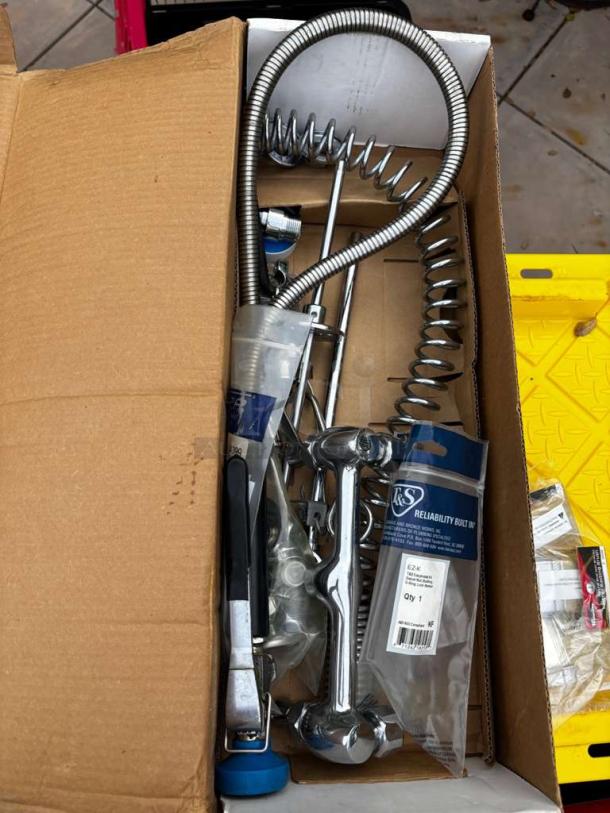 T&S Brass Commercial Pre-Rinse Faucet Assembly in box. Stainless steel, inspected, ready for service, model OAS-S-PRS-0652.