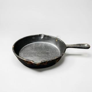 Heavy-duty cast iron skillet by Commercial Cookware Supplier, model Classic Cast Iron Skillet. Prime condition, ready for use.