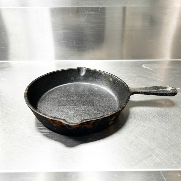 Heavy-duty cast iron skillet from Commercial Cookware Supplier, model Classic. Prime condition, inspected for kitchen use.