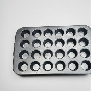 Commercial 24-cup muffin pan, elite condition, non-stick, heavy-duty for bakery use, fully inspected, model OAS-S-MFN-0654.
