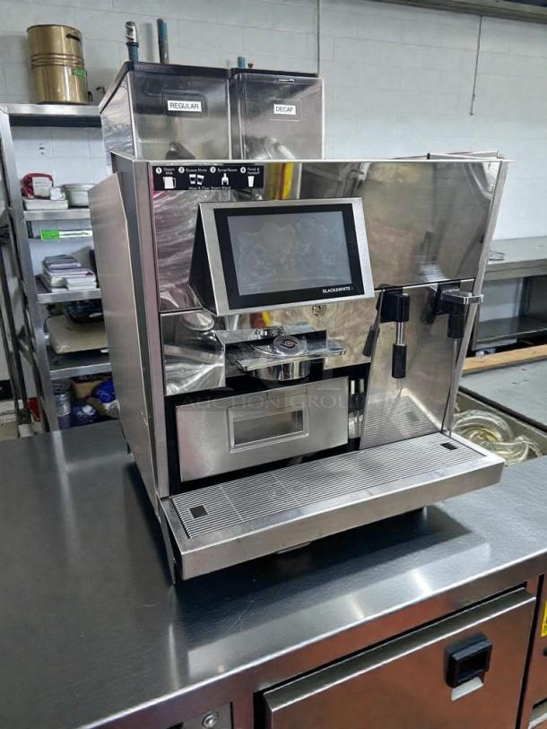 Thermoplan Black&White 3 espresso machine, premium condition, 208V, UL & NSF listed, with touch screen and labeled hoppers.