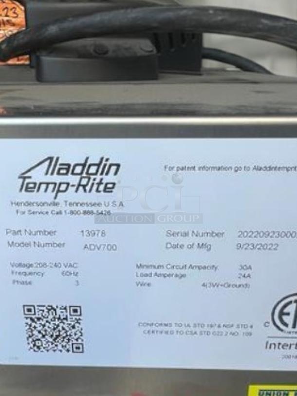 Aladdin Temp-Rite ADV700 commercial food heating system label, showing model, part number, voltage, and manufacturing date. Fully tested, operational.