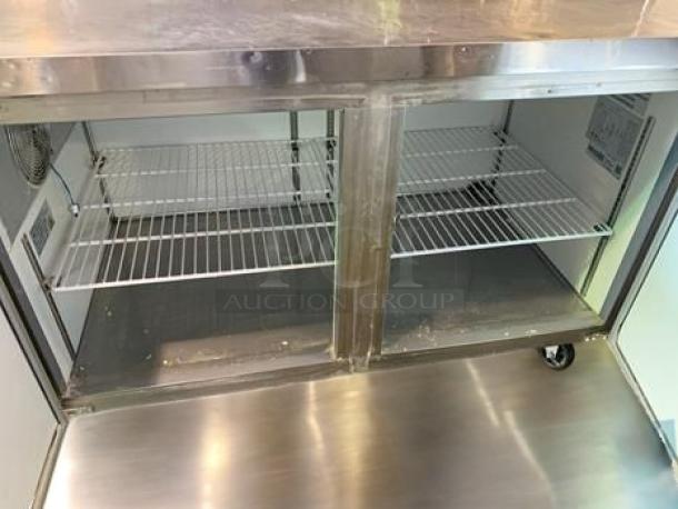 Randell 84120M refrigerated sandwich prep table, 120 in, dual lid, stainless steel, shelves visible, excellent condition.