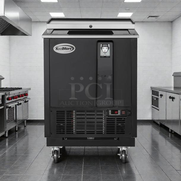 Brand new KoolMore KM-BOC25-BK commercial bottle cooler, 25 in., 5 cu. ft., built-in opener, ETL listed, on wheels.