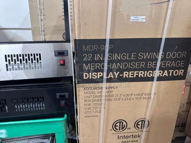 Brand new KoolMore MDR-9CP 22" display refrigerator, ETL listed, single swing door, commercial use, in packaging.