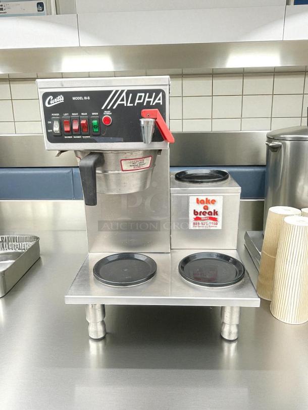 Wilbur Curtis ALPHA-III-S 3-warmer coffee brewer, stainless steel, with hot water faucet, buttons labeled for operation, premium condition.