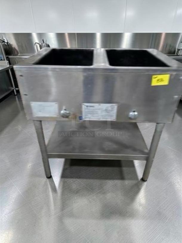 Commercial Stainless Steel Dual Well Electric Hot Food Table, elite condition, 115V, tested and operational, model STEAM-M-HT-0535.