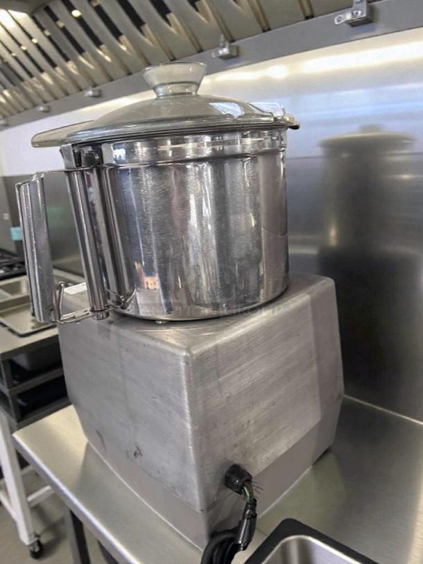 Robot Coupe R602 commercial food processor in stainless steel, premium condition. UL & NSF listed, fully tested and operational.