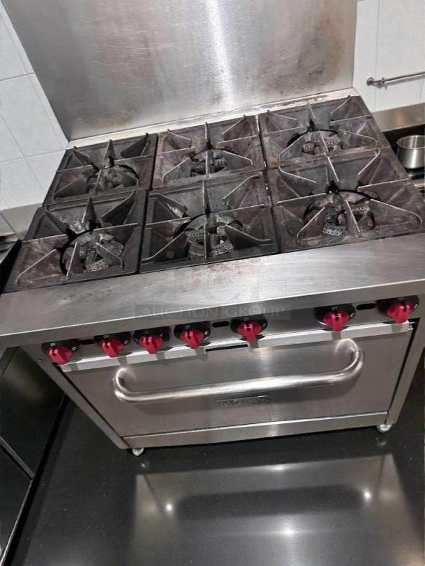 Montague 6-Burner Commercial Gas Range with Oven, NSF listed, fully tested, stainless steel, red knobs, natural gas.
