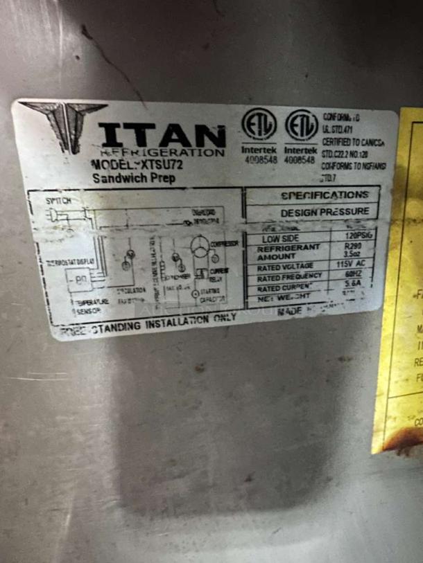Titan XTSU72 Sandwich Prep Table Refrigerator label showing model, ETL listing, and specifications.