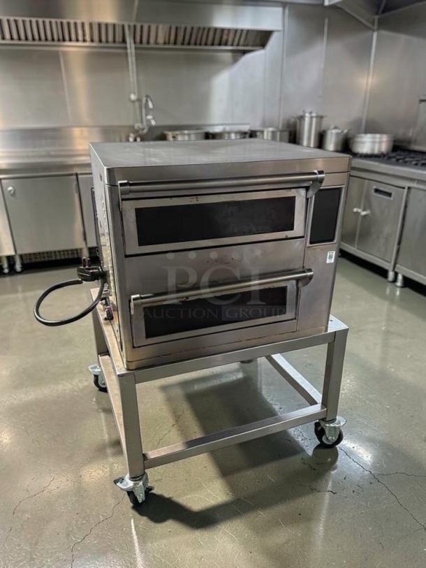TurboChef HHD-9500 ventless countertop oven, excellent condition, stainless steel, on a wheeled stand, fully operational.