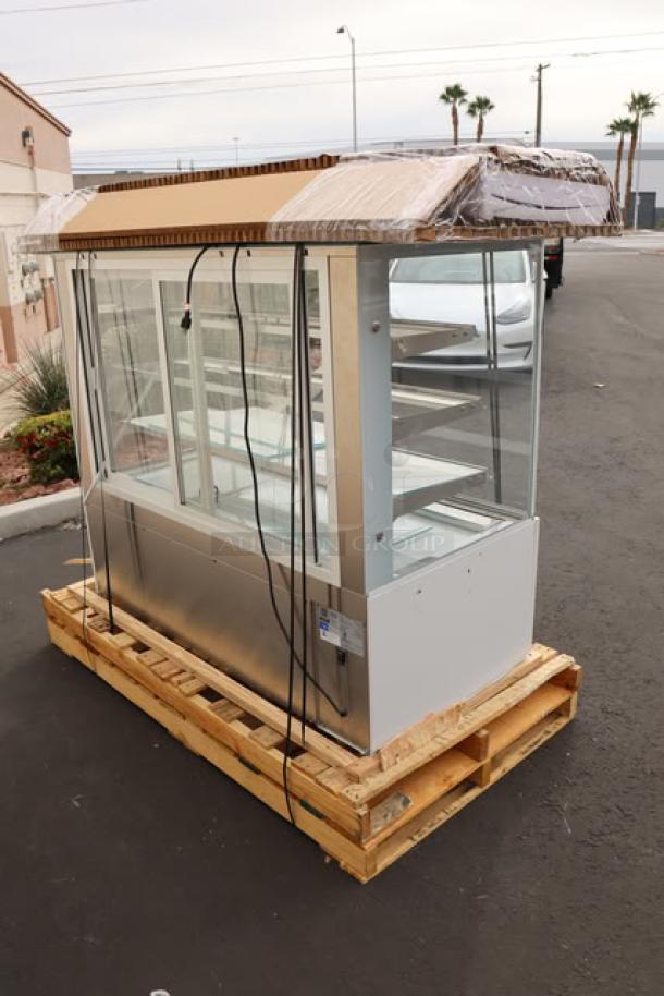 Brand new Avantco BCD-60-SW 60" white dry bakery display case on pallet, minor parts possibly missing.