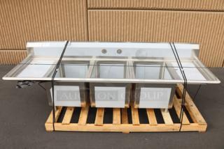 Regency 94" stainless steel sink, three compartments, two drainboards, 16 gauge. Minor scratches, scuffs, dents visible. Model 600S31824218.