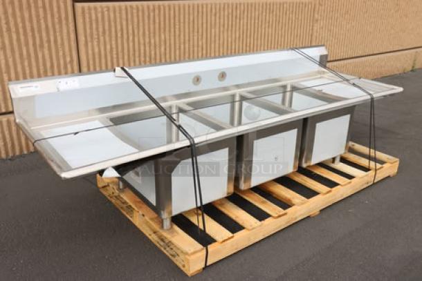 Regency 94" 16 gauge stainless steel three compartment sink with 2 drainboards, model 600S31824218. Slight scratching and minor dents.