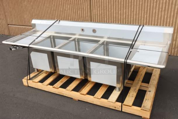 Regency 94" stainless steel 3-compartment sink, model 600S31824218, with 2 drainboards, minor scratches/dents, on pallet.