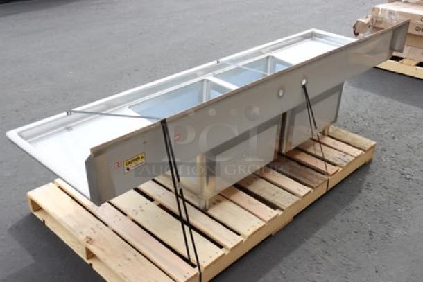 Regency S2C232312-24L&R 96" stainless steel two-compartment sink with two drainboards, unboxed, minor scuffs.