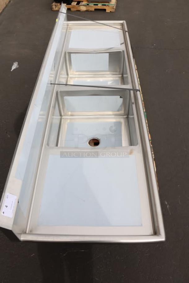 Regency S2C232312-24L&R 96" stainless steel two-compartment sink with 2 drainboards, new, unboxed, minor scuffing.