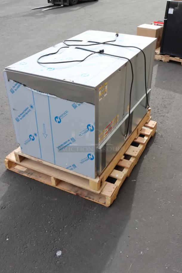 Brand new Beverage-Air UCRF48AHC-1-SA-B-23 dual temp undercounter fridge/freezer on pallet. Superficial scuffs visible.