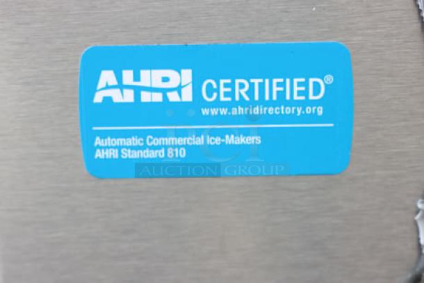 BRAND NEW Manitowoc IYT1500A ice machine, 48", air cooled, 1660 lb capacity. AHRI Certified label visible. Exterior scratched.