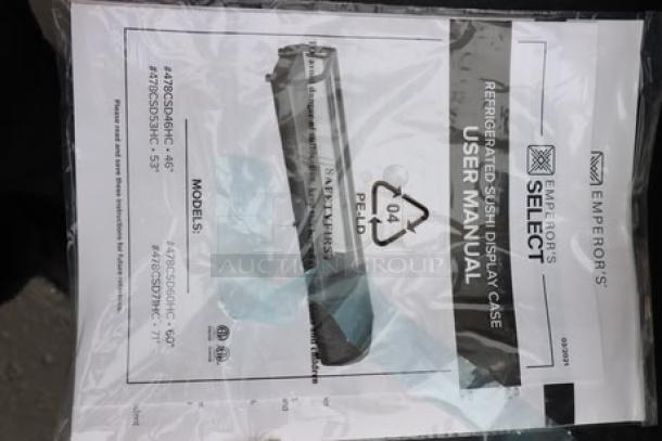 Brand new Emperor's Select CSD-60 sushi display case manual. Model and safety details visible in plastic wrapping.