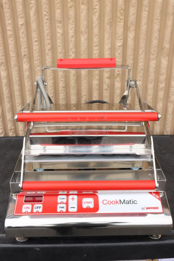 "Pavoni Cookmatic Pastry/Tartlet Heated Press, 110V, S/N: 2414142, missing plate insert, new condition, red control panel."