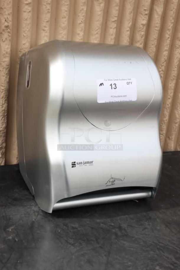 San Jamar T8370SS Hybrid stainless steel look hands-free paper towel dispenser, new scratch-n-dent condition, with label.