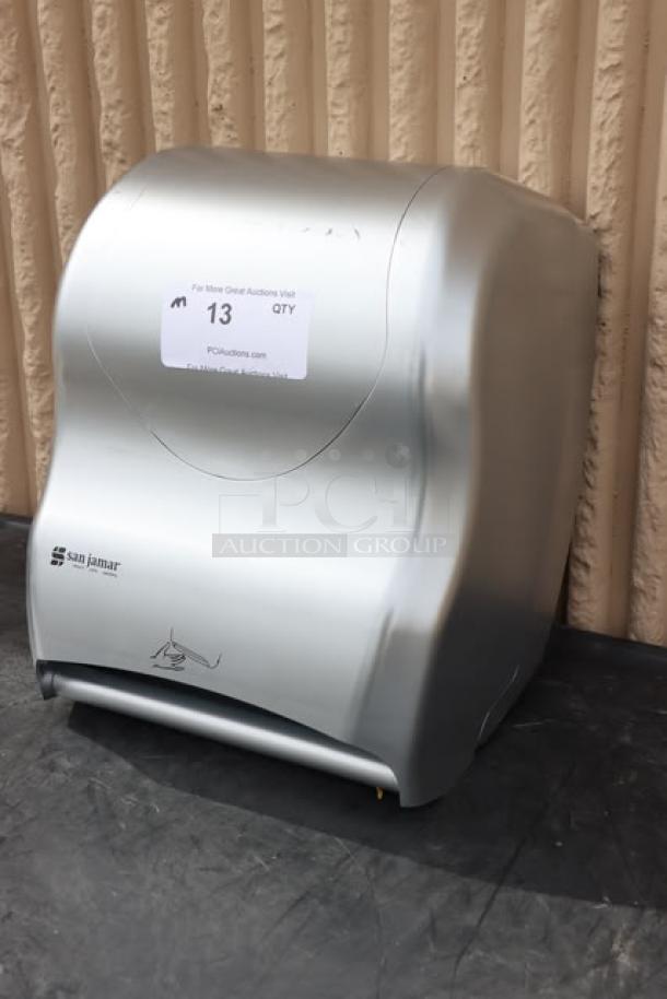 Brand new San Jamar T8370SS scratch-n-dent hands-free paper towel dispenser, stainless steel look, with visible label.