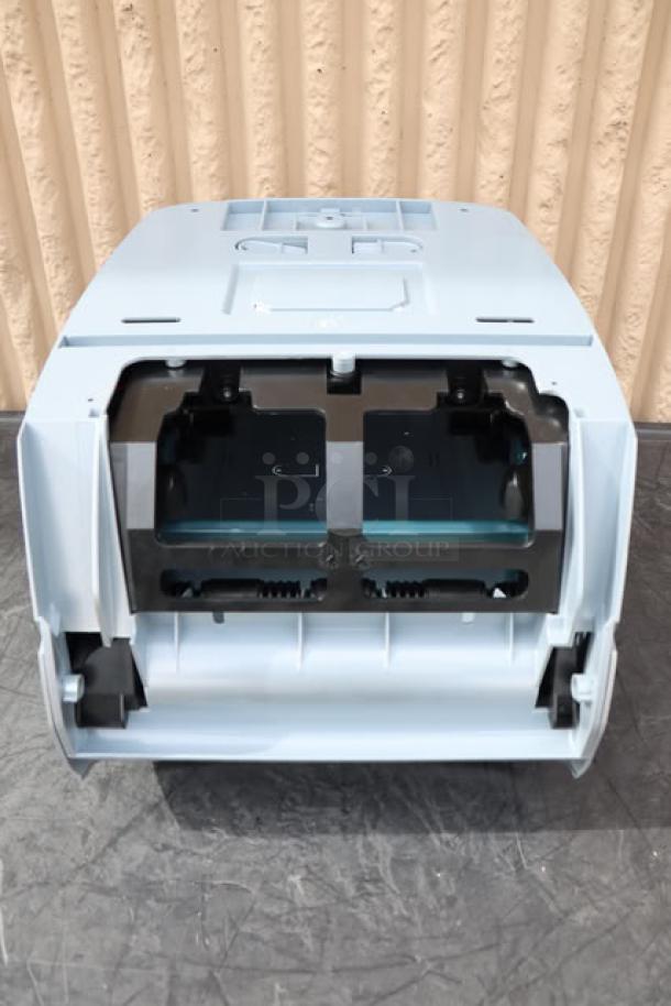 BRAND NEW SCRATCH-N-DENT San Jamar T8370SS hands-free paper towel dispenser in stainless steel look, open front view.