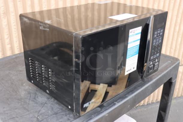 Brand new Danby 3.1MF7-7B1 MicroFridge, 3.1 Cu. Ft., black, two-door refrigerator/freezer with microwave, 115V, 15A.