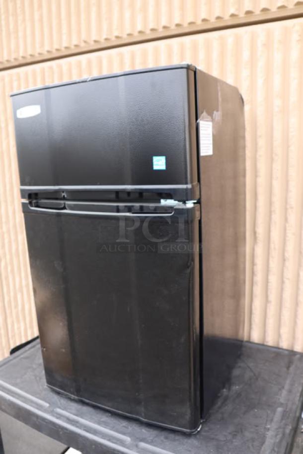 Brand new Danby 3.1MF7-7B1 MicroFridge, 3.1 cu. ft. black, two-door refrigerator/freezer with microwave; 115V, 15A.