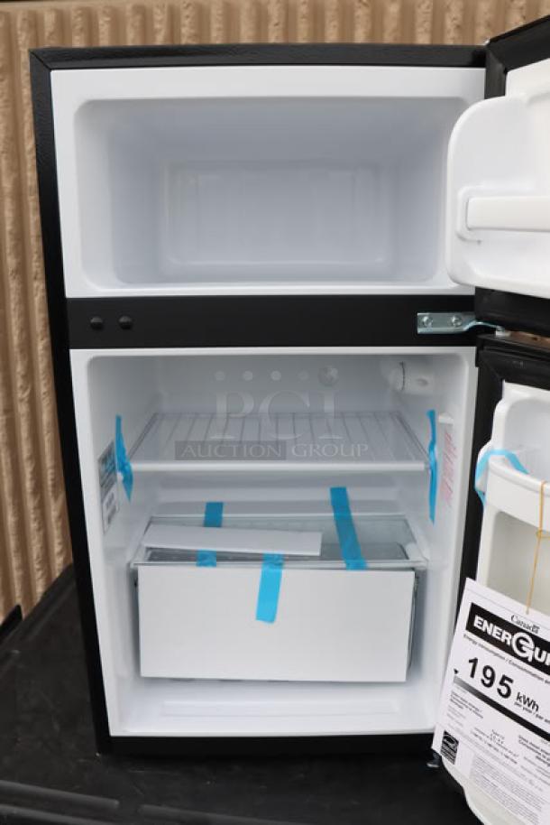 Danby 3.1MF7-7B1 MicroFridge, 3.1 Cu. Ft., black, two-door, new condition, EnergyGuide label showing 195 kWh.